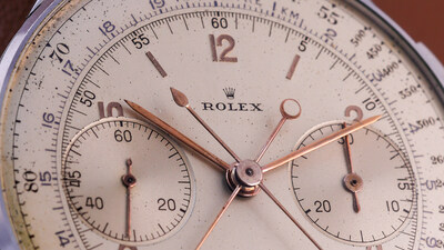 Detail of the silvered dial attributed to Beyeler workshops, displaying the dual tachymetre and telemeter scales with applied white-gold indexes Detail of the silvered dial attributed to Beyeler workshops, displaying the dual tachymetre and telemeter scales with applied white-gold indexes
